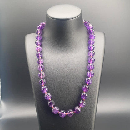 Collana di 42 cm in ametista sfaccettata viola infilata a nodi, pezzo unico