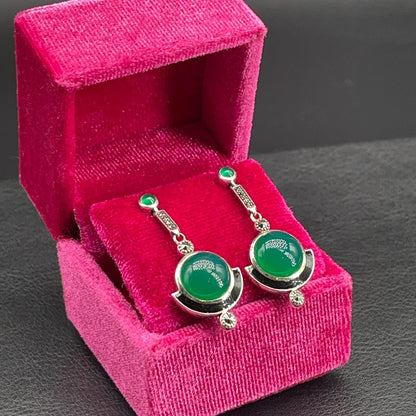 Orecchini in argento con agata verde cabochon e marcassiti in esposizione diagonale